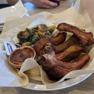 Halftime Ribs with a side of delicious Brussels Sprouts! Highly recommend any chicken, rib, or burger!