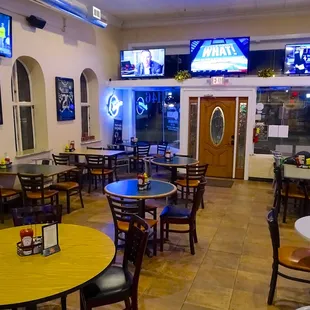 Front of dining room, furthest from bar area if you want quiet.