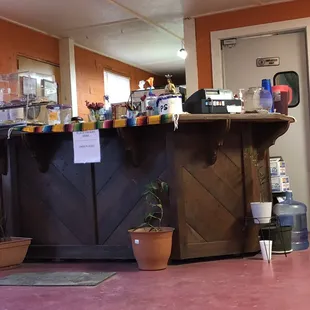 a kitchen with a bar