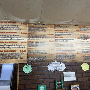 Large menu along wall by counter where you order