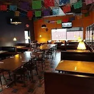 tables, chairs, and a television