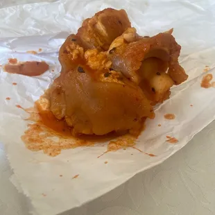 a half eaten stuffed potato
