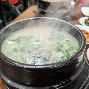a steaming pot of soup