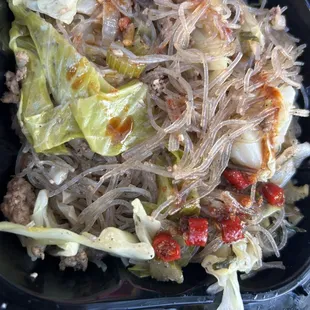 Pancit  but minus the chili peppers ( I carry my own)