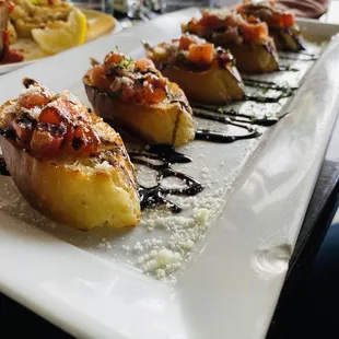 The Bruschetta another must try appetizer! Presentation is awesome!