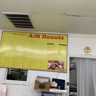 a menu hanging on the wall