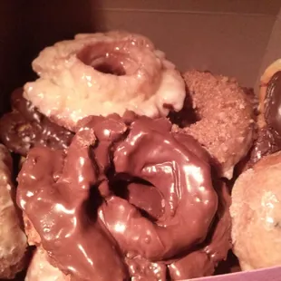 Dozen donuts of our favorites $8.49-glazed and crumb blueberry donuts still warm :)