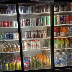 a refrigerator filled with drinks
