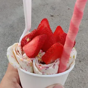 Fruity Pebbles rolled ice cream with strawberries