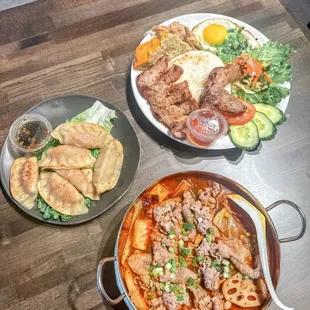 three plates of food on a table