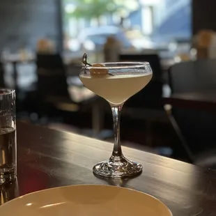 a cocktail in a martini glass