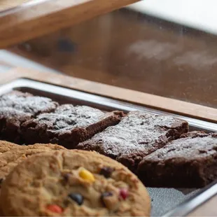 a display of cookies and pastries