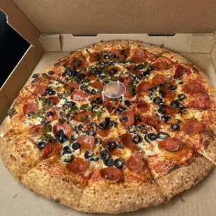 Easy cheese, pepperoni, olive and half green chile