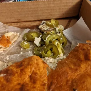 Looks like a whole jar of jalapenos. Thanks guys. 2 pieces of chicken???? Wtf
