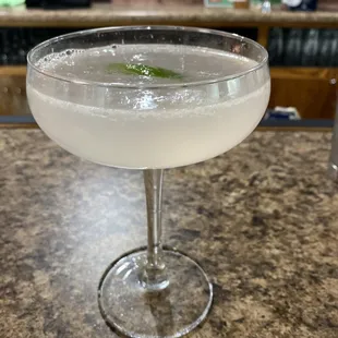 a cocktail in a coupe glass