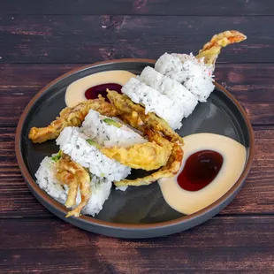 a plate of food on a wooden table