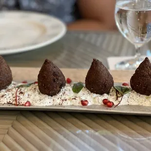 a plate of desserts on a table