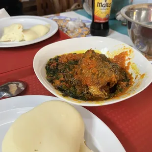 Eforiro, pounded yam, and Tilapia Fish