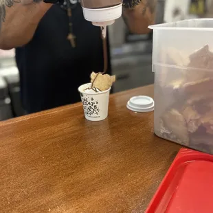 Adding the finishing touches chocolate drizzle