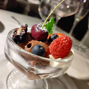 Dark chocolate mousse, almond Florentine with fruit.