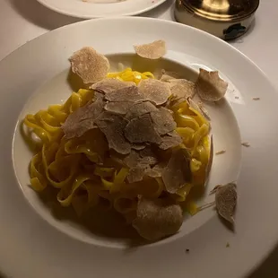 a plate of pasta and bread