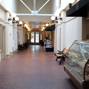 The two sweet cases in the hallway of the indoor mall old school mall property.