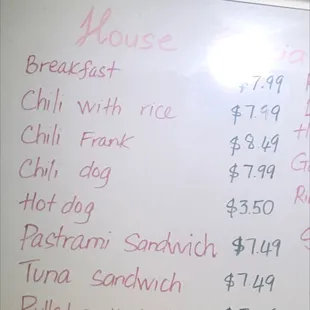 a list of drinks on a white board