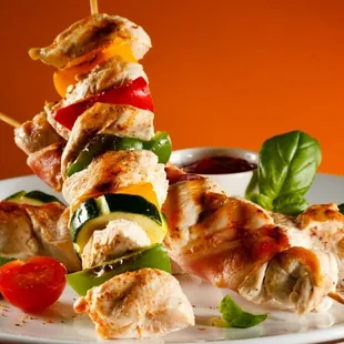 chicken skewers on a plate