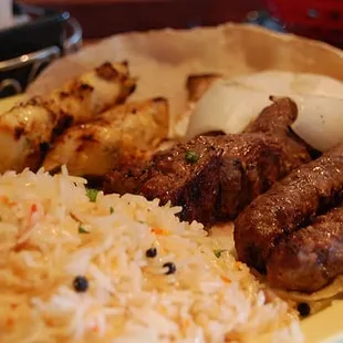 a plate of meat and rice