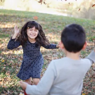Candid fun in the leaves
