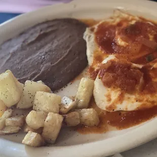 Huevos Rancheros! Love it when the salsa has the tomato consistency.