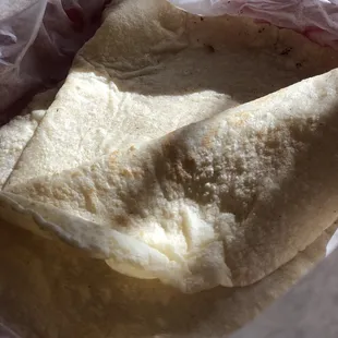 Homemade corn tortillas, light, and not the kind that break. Perfection!