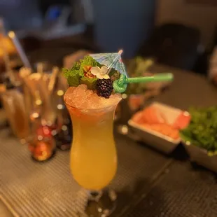 a cocktail on a bar table