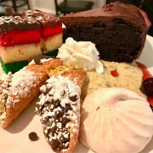 Desert platter with Homer Cannoli, Grandmas Chocolate Cake, and Italian Wedding Cake.
