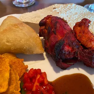 Samosa, pakora and tandoori chicken leg