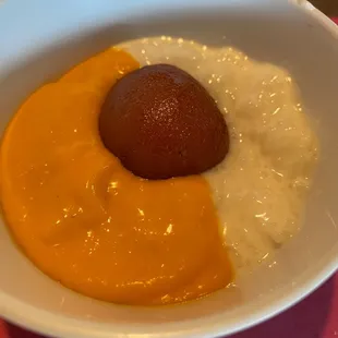 Half Kheer and half mango pudding topped with gulab jamun. The gulab jamun is too sweet on its own.