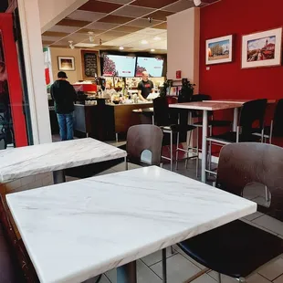 tables and chairs in a restaurant