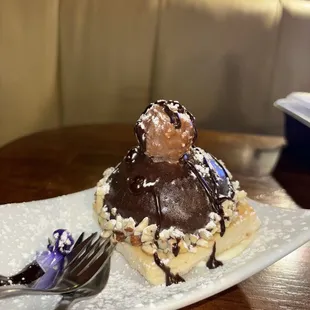 a dessert on a plate with a fork