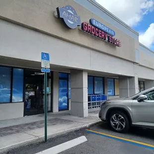 a car parked in front of the store