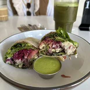 chicken salad (mary's organic chicken breast, mixed greens, pesto, &amp; pickled onions, served on a flour tortilla)