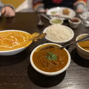 bowls of curry and rice