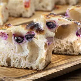 a piece of bread with olives