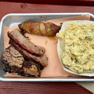 Brisket with potato salad and pig popper