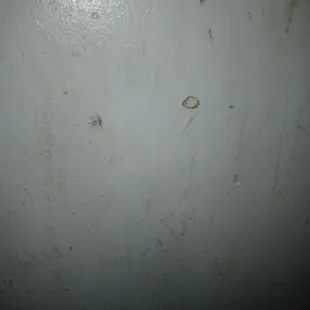 The wall in the room with no light
