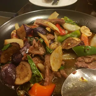 a stir fry with vegetables and meat