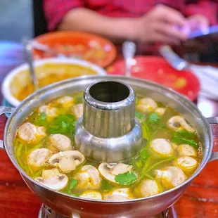 a hot pot of soup