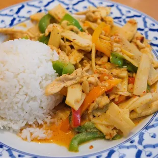a plate of rice and vegetables