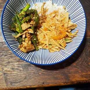 a blue and white plate of food