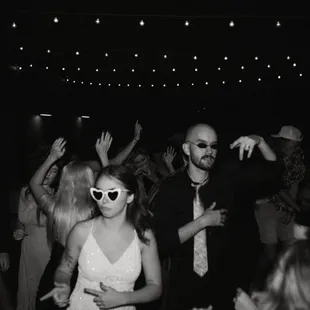 A photo of us, the bride and groom, dancing at our wedding reception