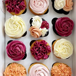 a dozen cupcakes in a box
